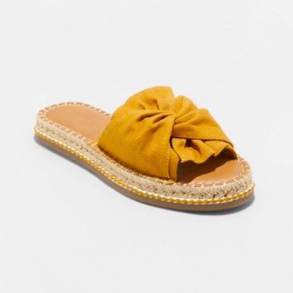 Flat espadrille cloth sandals.